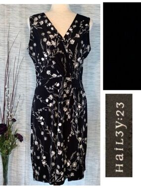 Hail3y:23 black with white floral sleeveless wrapped A-line dress.